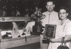 Richard and Helen Rice with awards for collections - founders of the Rice Northwest Museum of Rocks and Minerals - circa 1950s.