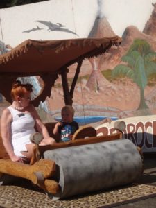 Posing in the Flintstone Mobile at the Rice Museum of Rocks and Minerals (2)