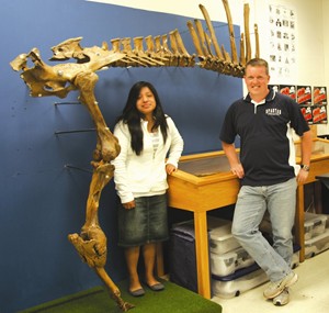 Odulia Flores and Woodburn Science Teacher David Ellingston with school fossil project