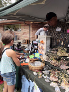Vendor booth featuring jewelry.