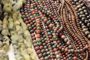 Polished beads on display in vendors booth.