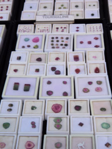 Precious gems on display in vendor's booth.