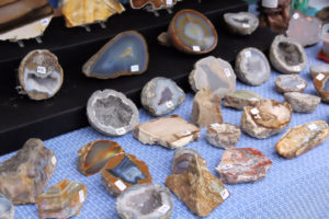 Vendor selling open geods and agates.