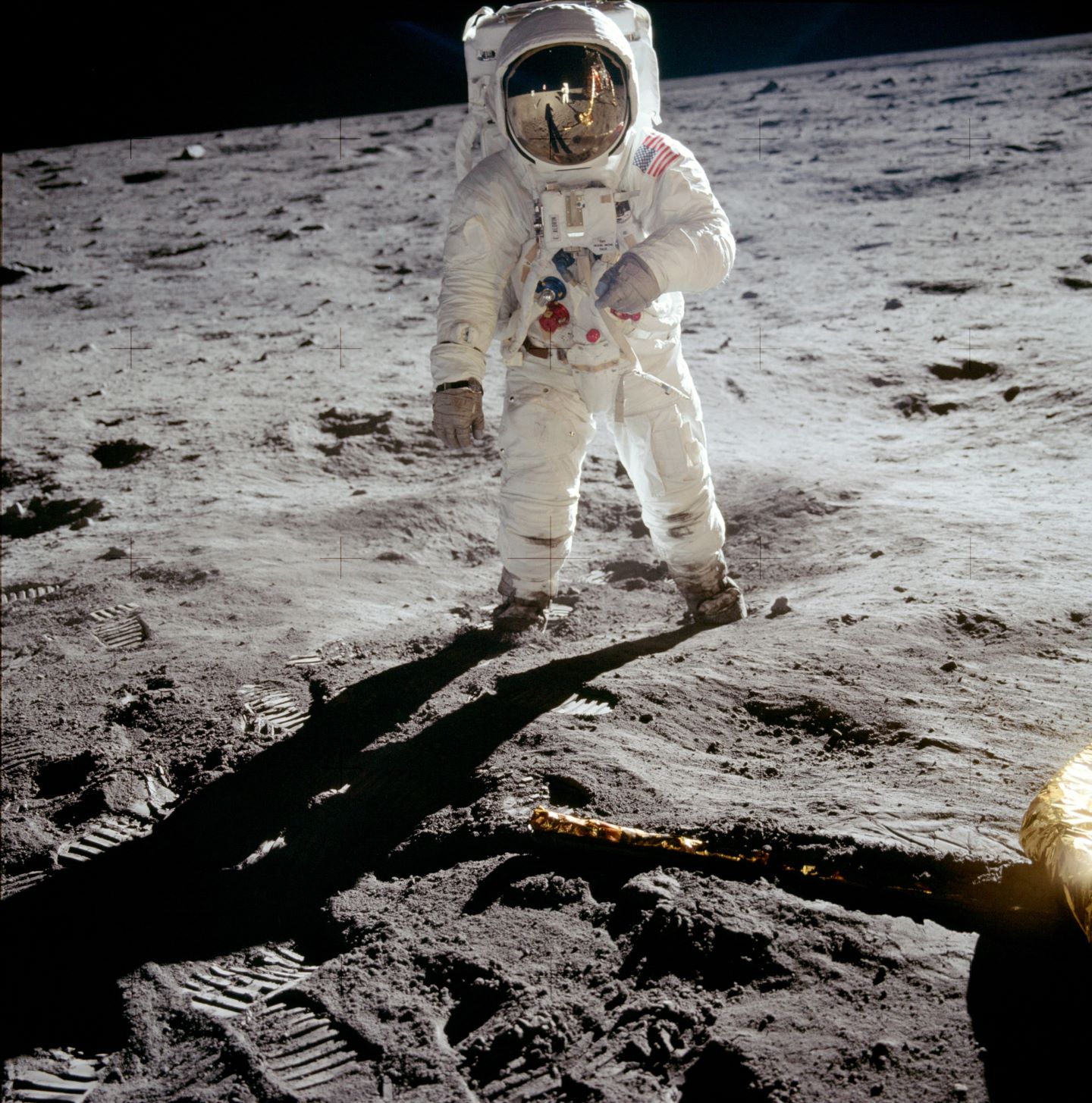 Astronaut Buzz Aldrin walks on the surface of the moon