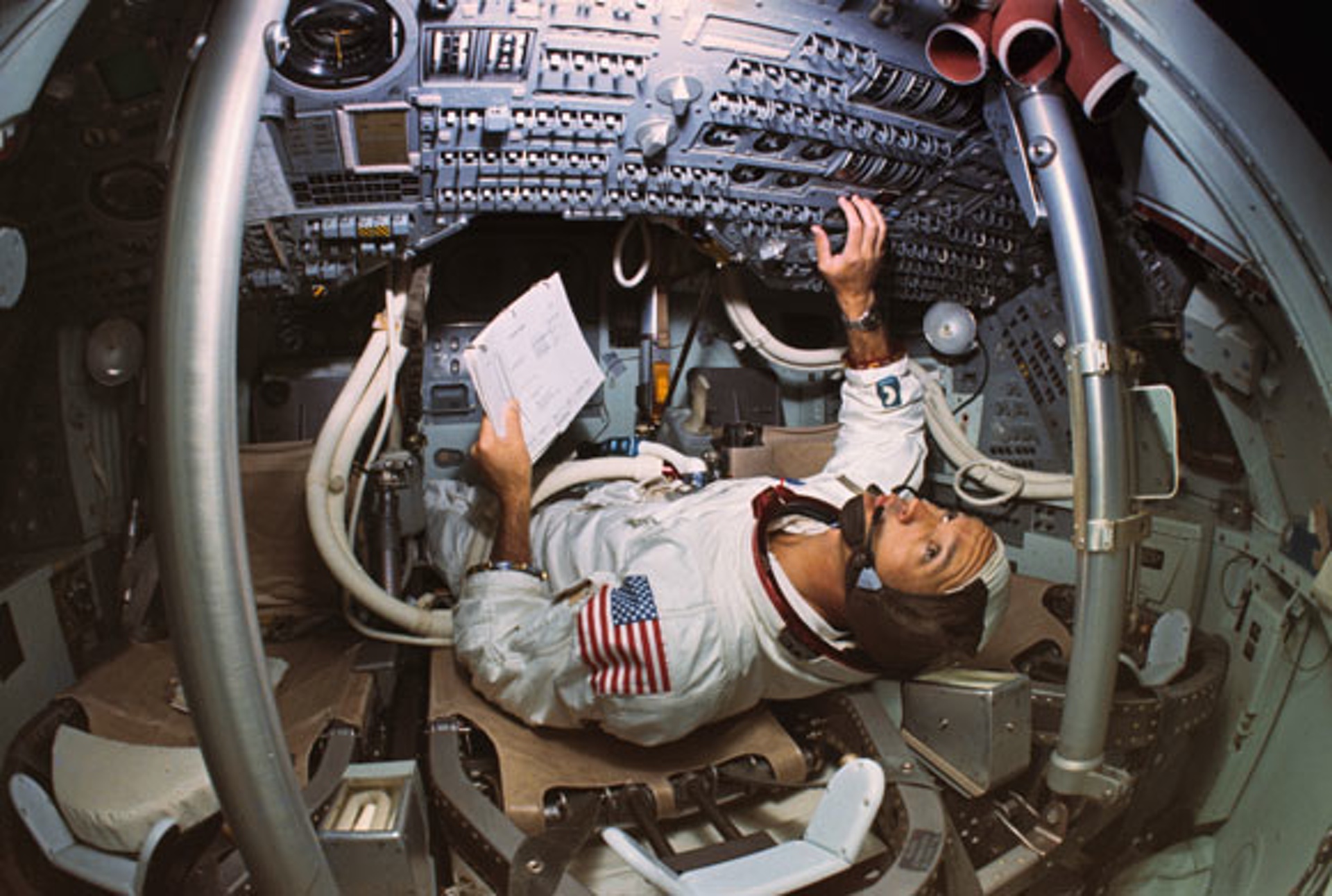 Columbia command module pilot Michael Collins inside the craft