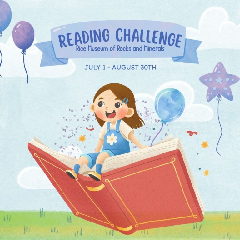 Girl sitting on a giant book.